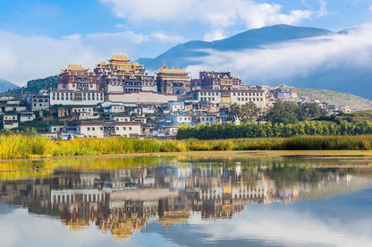 Lijiang + Jade Dragon Snow Mountain + Shangri-La + Xishuangbanna8-Day 7-Night Private Tour