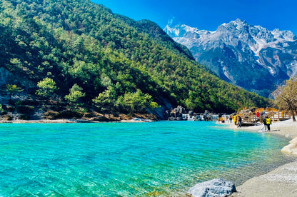 Lijiang + Jade Dragon Snow Mountain + Shangri-La + Xishuangbanna8-Day 7-Night Private Tour